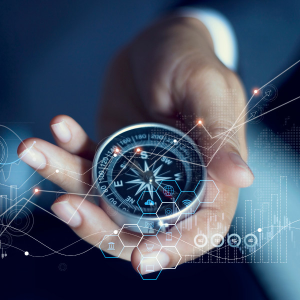 hand holding a compass image